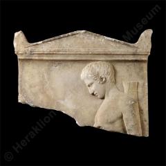 Marble funerary stele of young archer