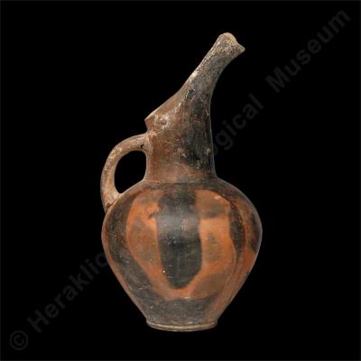 Clay beaked jug with mottled decoration