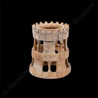 Clay cylindrical stand for vessels with religious symbols