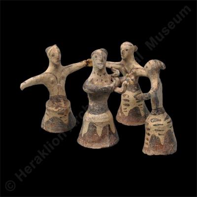 Group of female figurines representing dancers and musician