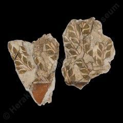 Two fresco fragments with myrtle branches