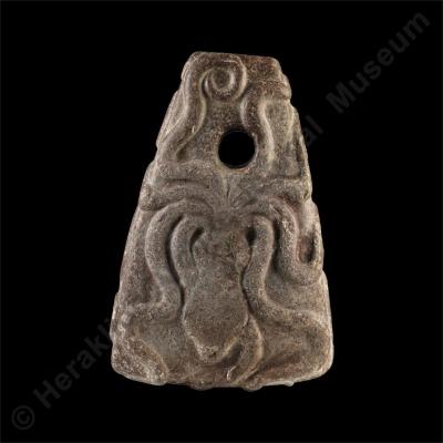 Porphyry pyramidal weight with octopus decoration
