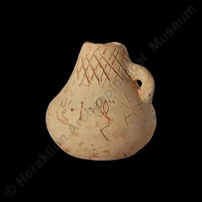 Clay juglet with Hieroglyphic inscription