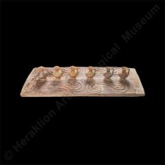 Clay rectangular tray with attached juglets