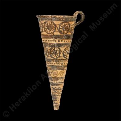 Conical rhyton with rosettes and spirals