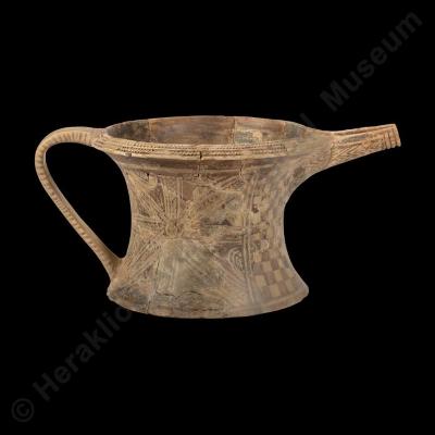 Single-handled spouted cup ("tankard") with dense painted decoration