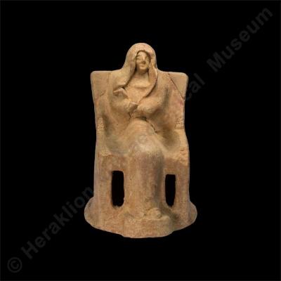 Enthroned female figurine